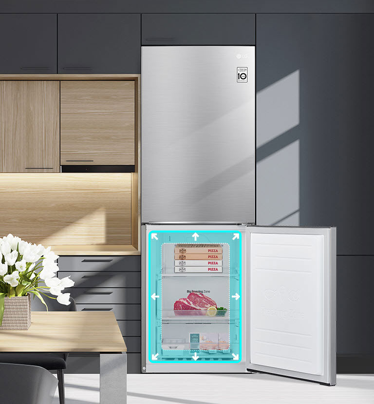 A refrigerator is shown blending with the shelving in the kitchen. The bottom half of the refrigerator is open and filled with produce. A neon square with arrows is shown around the edge of the refrigerator space to show there is more space inside.