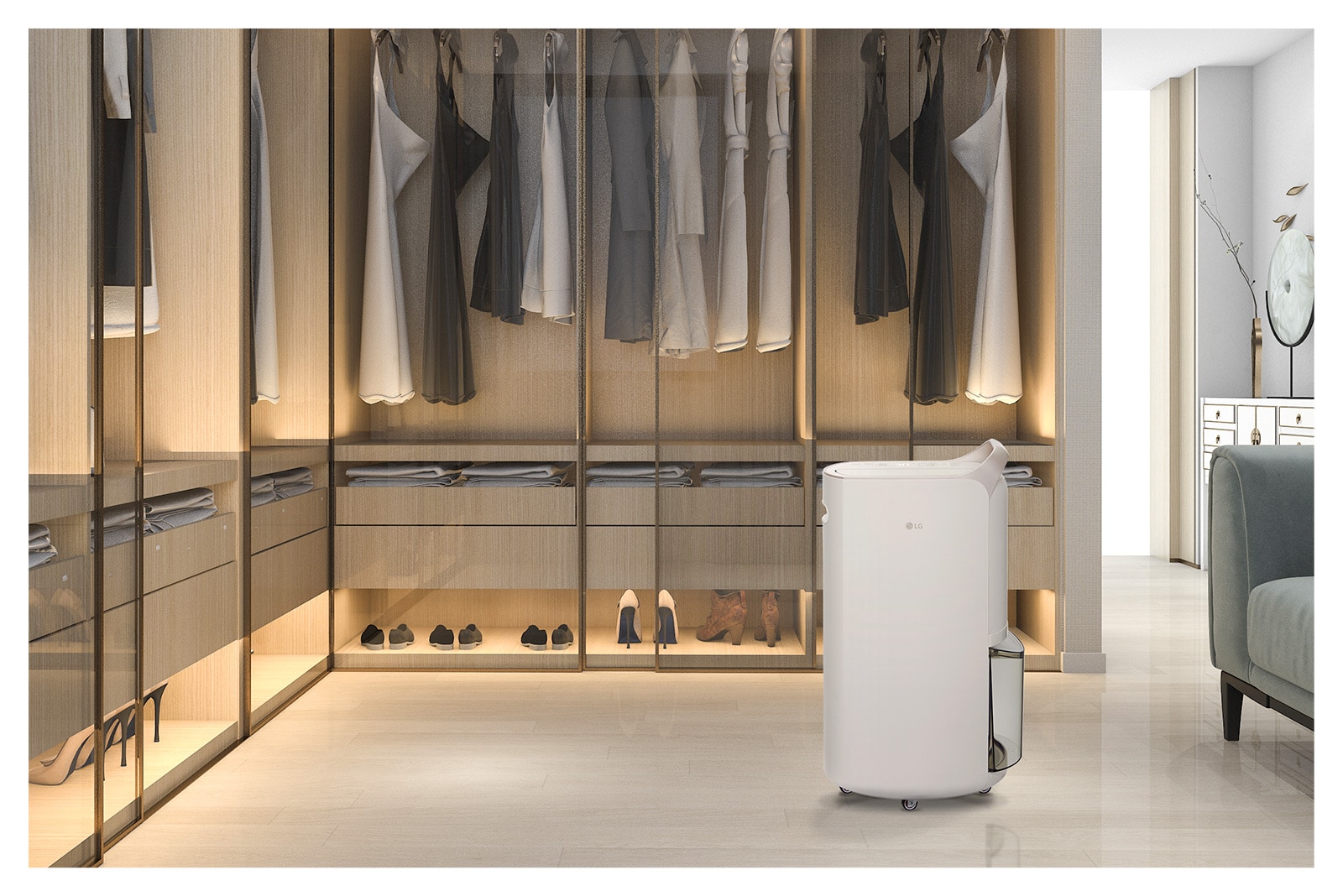 It shows calming beige color LG Puricare™  Dehumidifier is placed in a dressing room full of clothes.