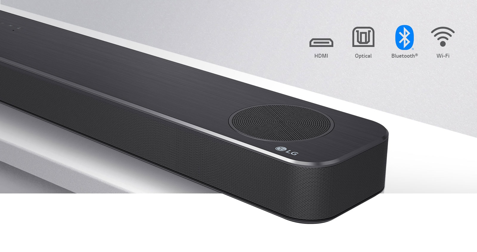 Close-up LG Soundbar right side with LG logo on the bottom right corner. Connectivity icons shown above the product. 