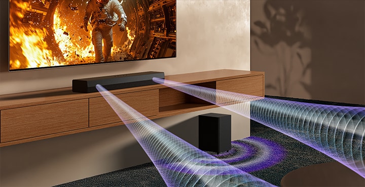 TV with scientific content is shown and S30A soundbar is placed right below. On the floor the soundbar's sub woofer also stands. White semi-transparent sound waves are coming widely out of soundbar and the subwoofer.