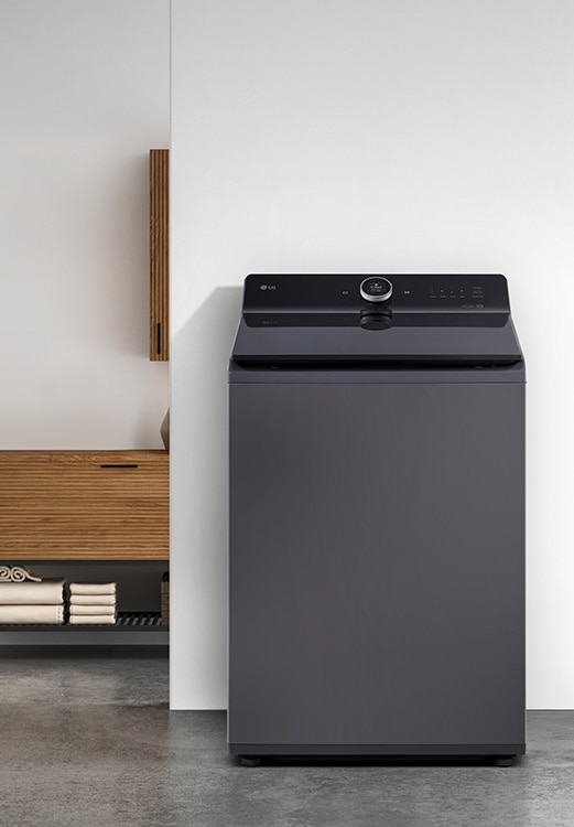 Lavadora LG carga superior en un cuarto de lavado