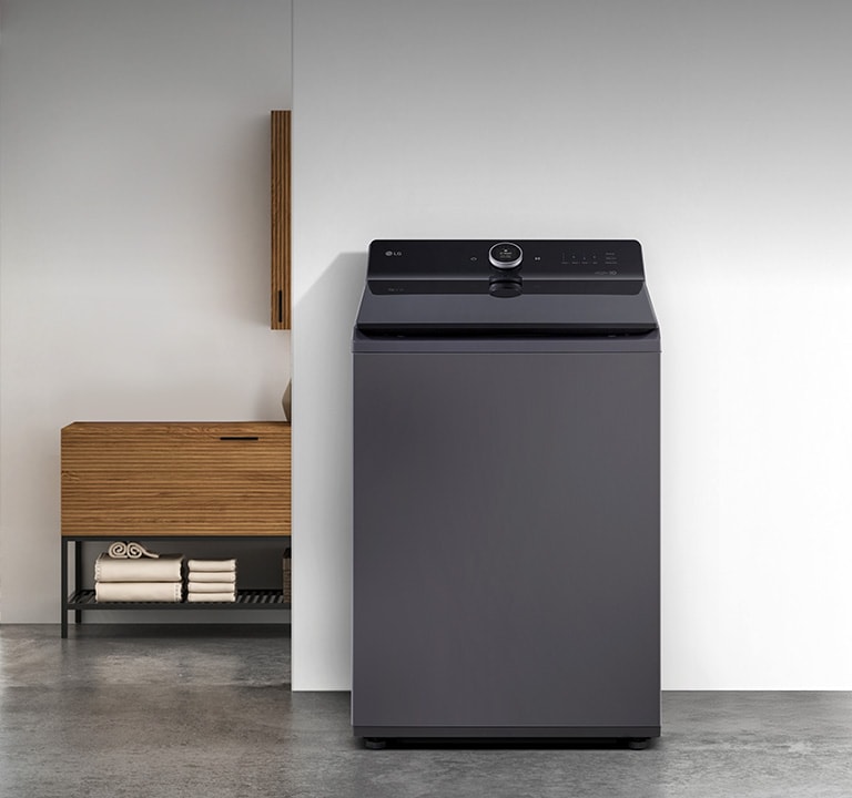 Lavadora LG carga superior en un cuarto de lavado
