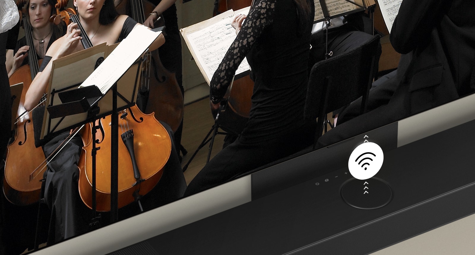 LG TV and LG soundbar mounted on the wall with a white Wi-Fi symbol graphic in the middle.