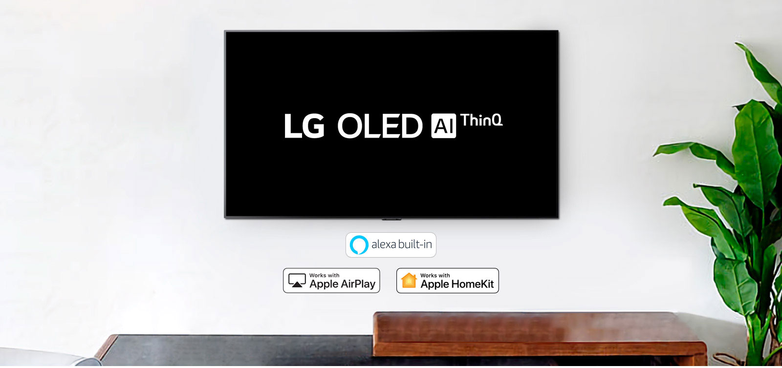 TV montada en la pared que muestra el logotipo de LG OLED AI ThinQ sobre un fondo negro