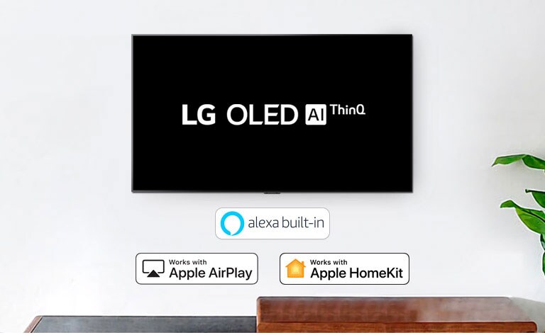 TV montada en la pared que muestra el logotipo de LG OLED AI ThinQ sobre un fondo negro