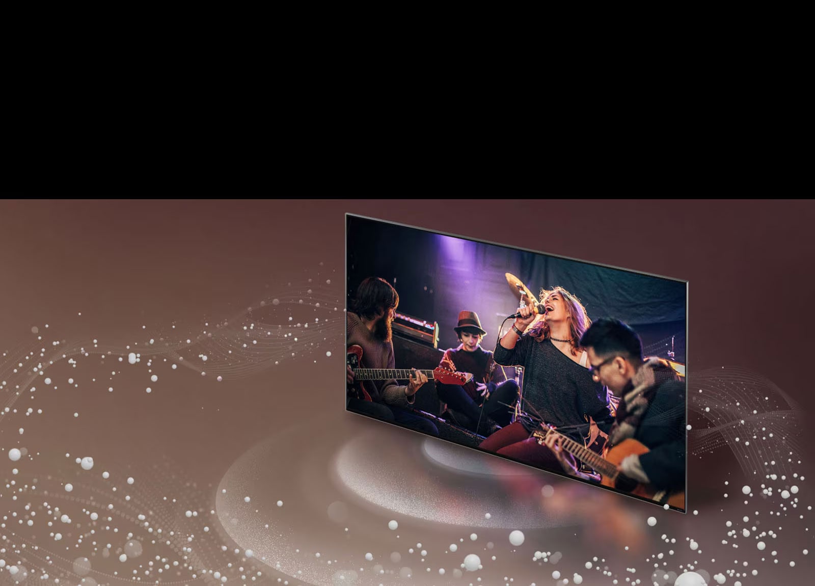 Uma imagem de bolhas e ondas sonoras saindo da tela de uma TV da LG e preenchendo o espaço.