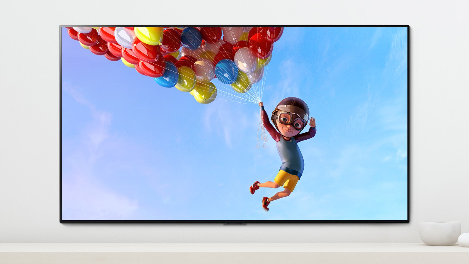 Una escena de una animación que muestra a un niño colgando de globos de colores en el cielo que se muestra en una pantalla de TV