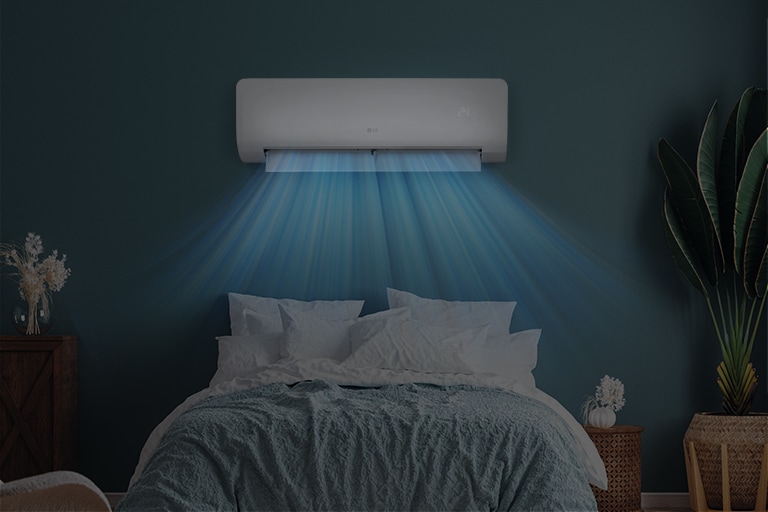 Vista del LED del aire acondicionado tenue en una habitación oscura.