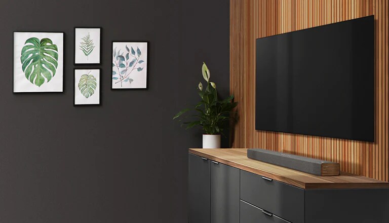 La barra de sonido con diseño vanguardista con acabados en tela y madera