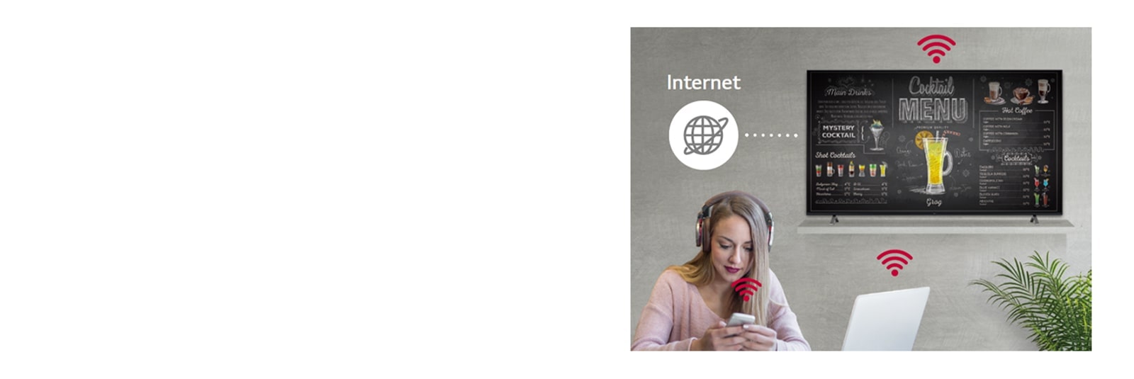 La serie UR640S está en la pared y una mujer usa una computadora personal y un teléfono móvil. Esta imagen muestra que la señalización puede funcionar como un enrutador virtual para que el computador y el móvil puedan conectarse en la pantalla y obtener acceso inalámbrico.