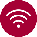 LG teler ja seinale kinnitatud LG ribakõlar, mille keskel on valge Wi-Fi sümbol.