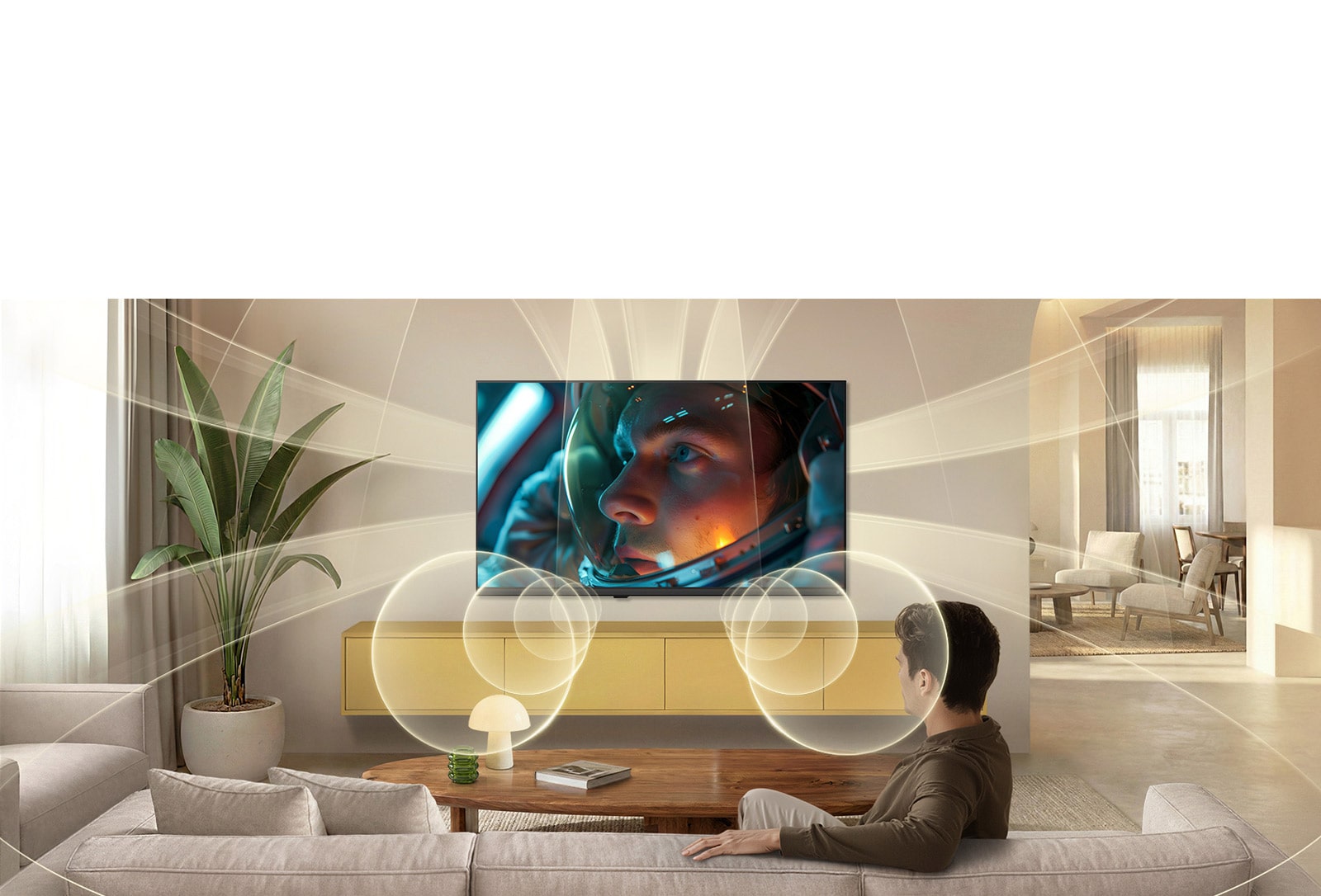 LG SMART TV AI LB70 FHD TV koos Virtual 9.1.2 Ch by AI Sound funktsiooniga täidab kaasaegse elutoa heliga, kus ekraanil mängib astronaudifilm, ümbritsedes ruumi mitmesihilise heliga sügavalt kaasahaarava elamuse saamiseks.