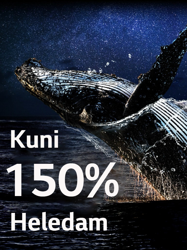 Mustal taustal ookeanist välja hüppav vaal. Sõnad "up to 150% brighter" (kuni 150% heledam) ilmuvad vaala kohale ja muutuvad heledamaks.