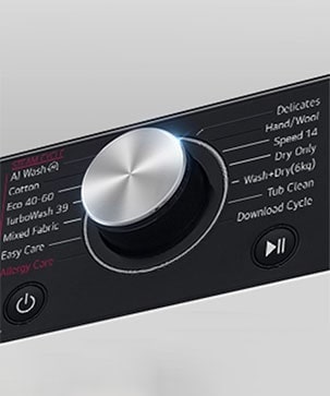 See on suurendatud kujutis pesumasina paneelil olevast metallnupust.