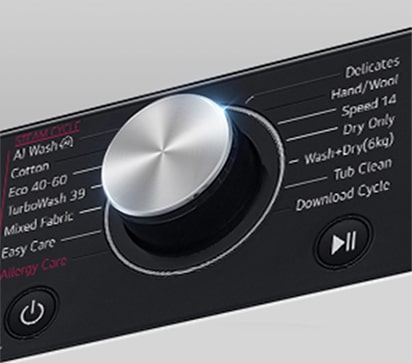 See on suurendatud kujutis pesumasina paneelil olevast metallnupust.