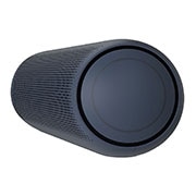 LG XBOOM Go PL5 kaasaskantav kõlar, LG XBOOM Go parempoolse bassikõlari lähivaade oranžis valguses., PL5, thumbnail 9