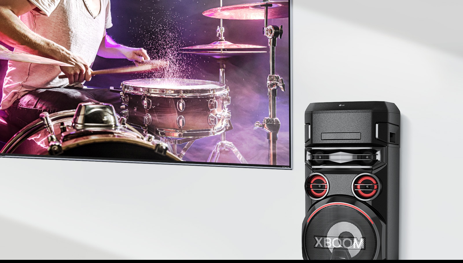 Seinal on teler ja sellest paremal on LG XBOOM