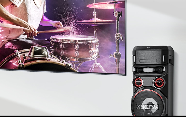 Seinal on teler ja sellest paremal on LG XBOOM
