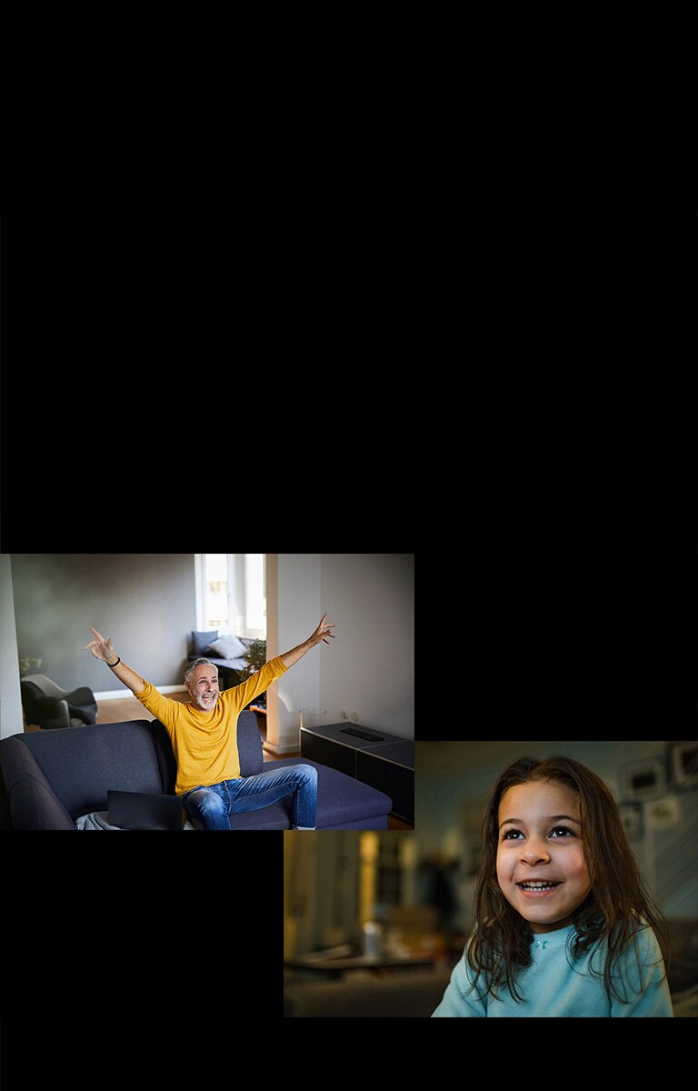 Vanaisa istub diivanil elutoas ja vaatab midagi õnnelikult vasakus ülanurgas pildil. Tüdruk vaatab midagi väga rõõmsalt.