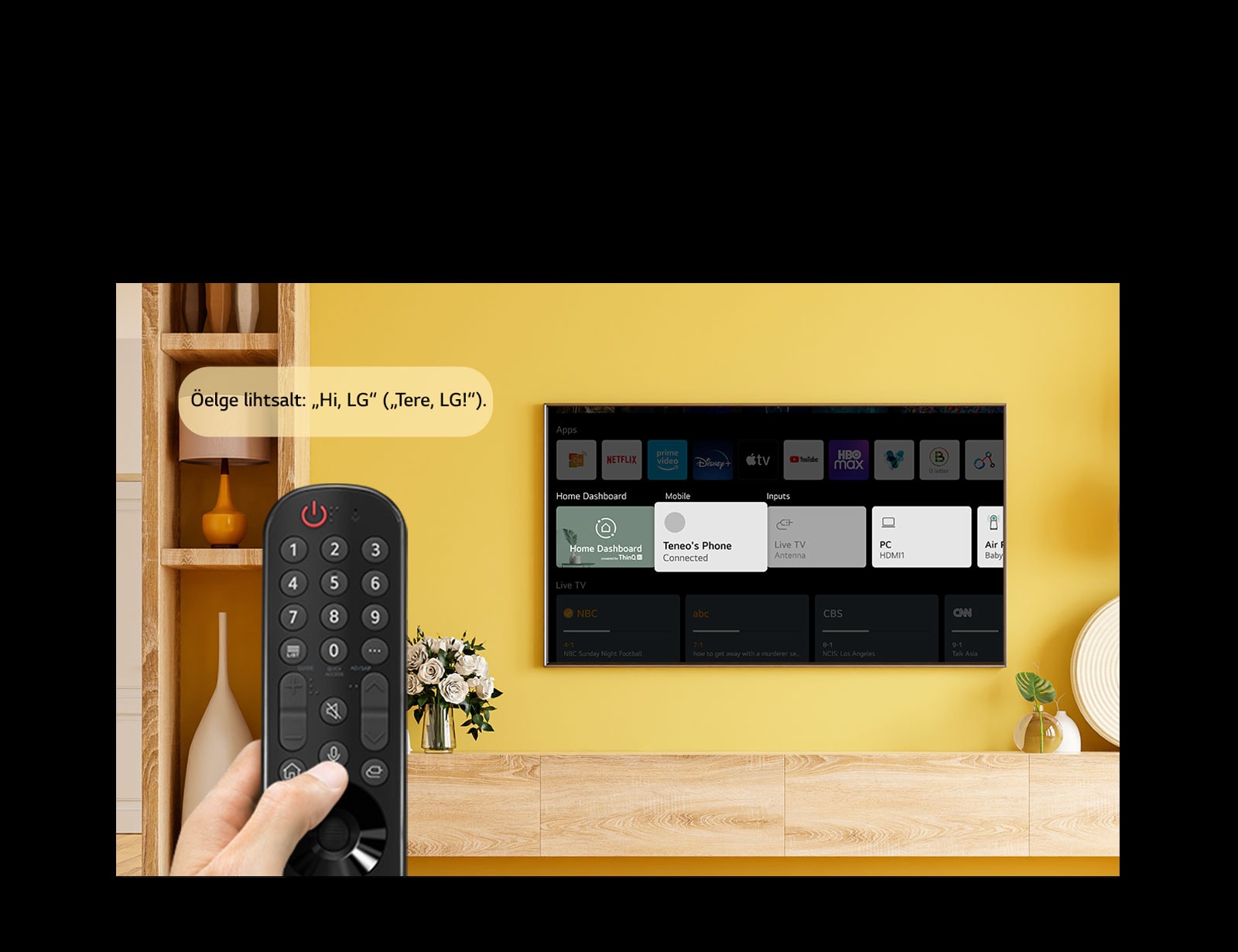 Keegi hoiab teleriekraani ees teleripulti. Jutumullis on tekst „Öelge lihtsalt Hi LG“.