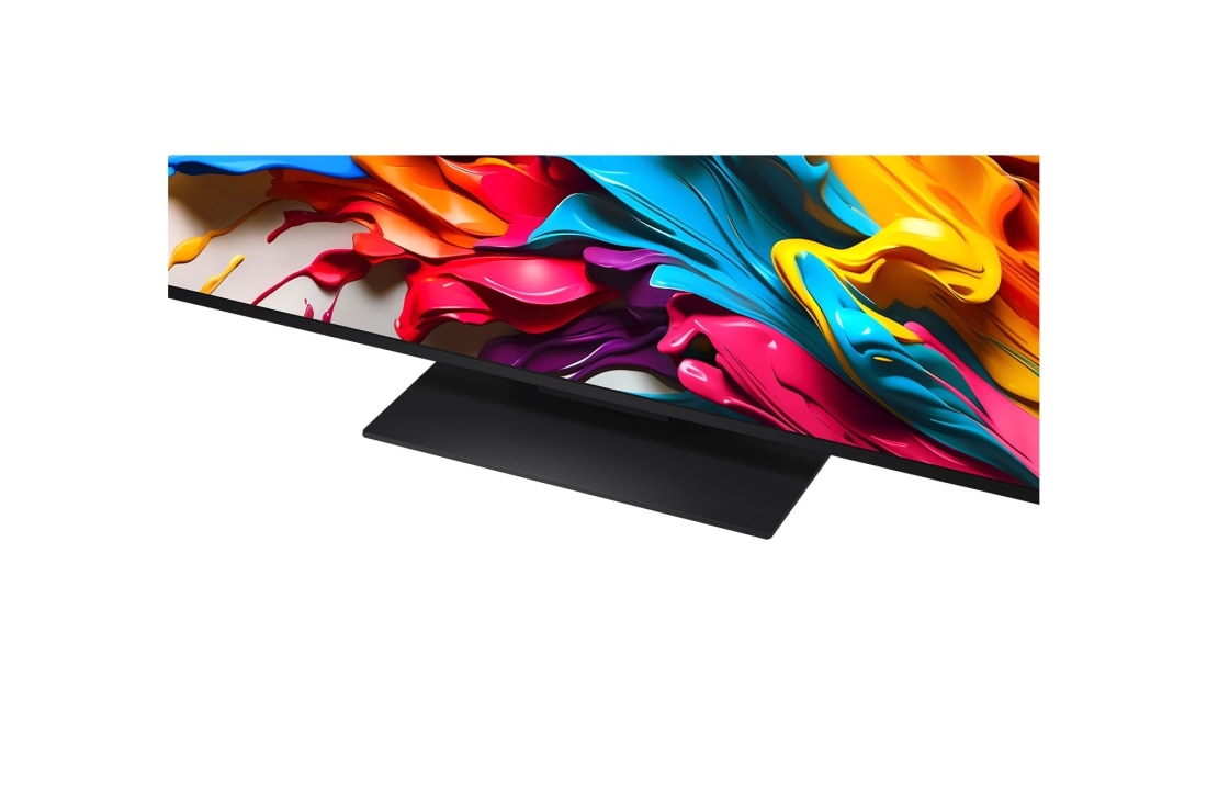 LG Traadita 65 tolline LG QNED evo AI QNED9M MiniLED koos 4K video ja heli ülekandega, Hämaralt valgustatud elutuba QNED9M-il kujutatud mänguekraaniga. Zero Connect Box asub kohvilaua sees. Teksis räägitakse 144 Hz ülitundlikust traadita mänguprotsessist ja madalast latentsusest., 65QNED9MA3B, thumbnail 5