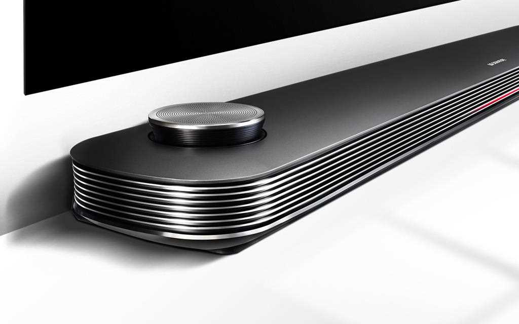 A sound bar image of LG SIGNATURE W7 TV, compatible with Dolby Vision and Dolby Atmos.