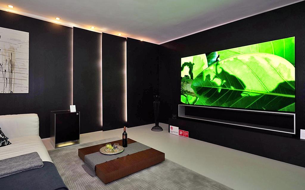The perfect theatre room, equipped with paper thin TV and a speaker system that's sure to send the perfect sound in the right directions | More at LG MAGAZINE