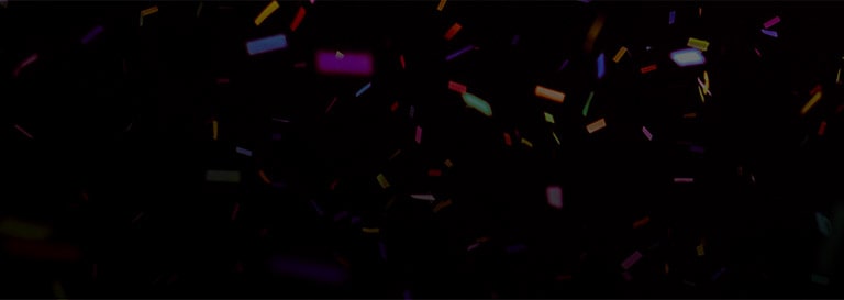 LG TV urheilukäyttöön on visualisoitu värikkäillä konfeteilla, jotka lentävät tummaa taustaa vasten luoden dynaamisen ja energisen tunnelman eloisalla liikkeellä ja kerroksellisilla väripurskeilla.