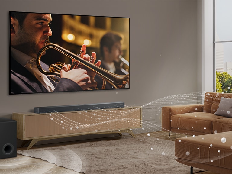 LG Soundbar, LG TV ja subwoofer modernissa kaupunkiasunnossa. LG Soundbar -äänipalkista lähtee kolme ääniaaltojen haaraa, jotka muodostuvat lattialla kelluvista valkoisista pisaroista. Soundbarin vieressä oleva subwoofer luo äänitehosteen alhaalta päin.