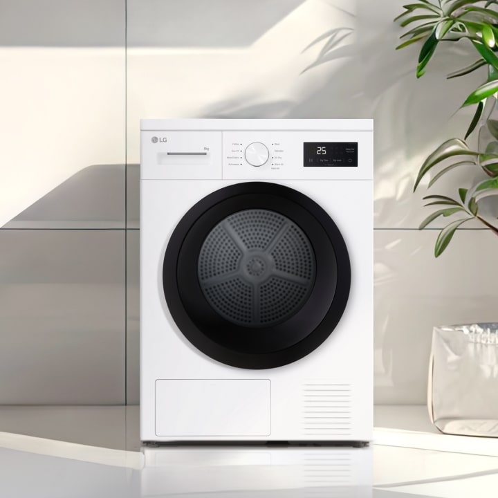 Edestä täytettävä kuivain pyykkitilassa