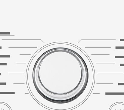 Tässä on suurennettu kuva pesukoneen käyttöpaneelin metallivalitsimesta.