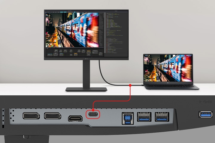 Kuva kannettavasta ja näytöstä, jotka on yhdistetty yhdellä USB Type-C-kaapelilla.