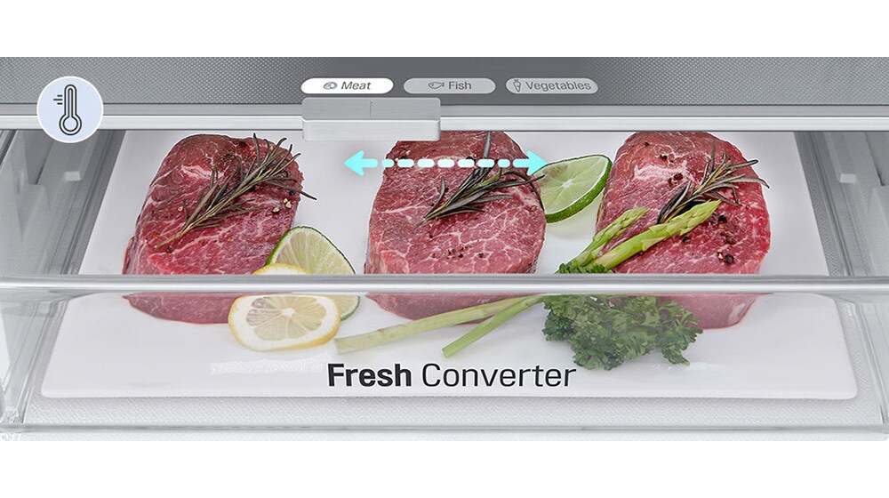 Lähikuva lihatuotteilla täytetystä Fresh Converter -laatikosta, jossa on lämpötilan valitsin&nbsp;liha-, kala- ja vihannestuotteille. Laatikon lämpötilan taso on asetettu lihatuotteille sopivaksi.