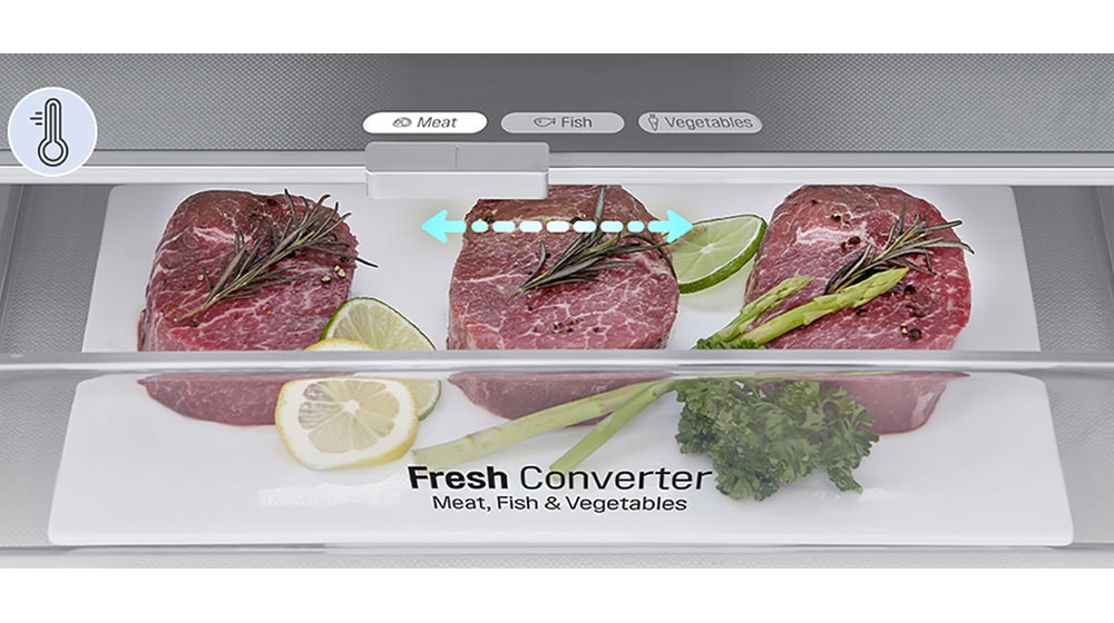 Lähikuva lihatuotteilla täytetystä Fresh Converter -laatikosta, jossa on lämpötilan valitsin&nbsp;liha-, kala- ja vihannestuotteille. Laatikon lämpötilan taso on asetettu lihatuotteille sopivaksi.