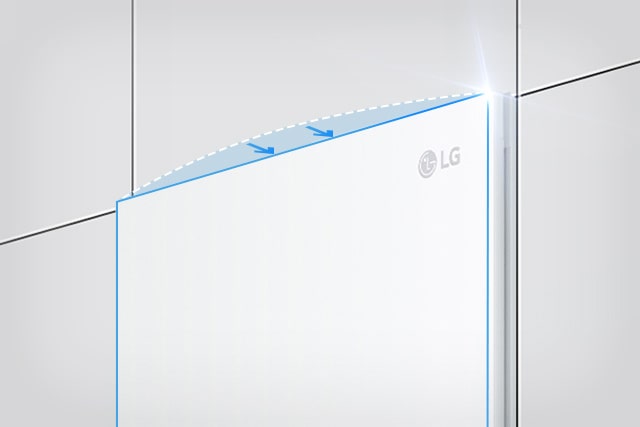 Pakastimen yläosa näytetään viistosta suunnasta. Kaksi nuolta osoittaa seinää kohti osoittaen, että pakastin istuu saumattomasti ympäröiviin kalusteisiin.