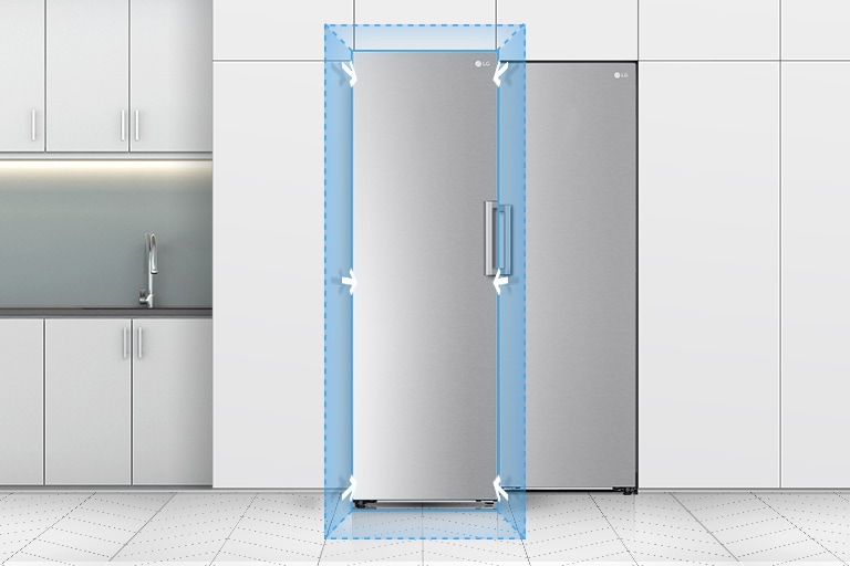 Pakastimen etuosa näytetään osana keittiötä. Sininen kolmiulotteinen kuutio ja sisäänpäin ovea kohti osoittavat nuolet näyttävät, miten pakastin istuu täydellisesti vakiomalliseen keittiöön.