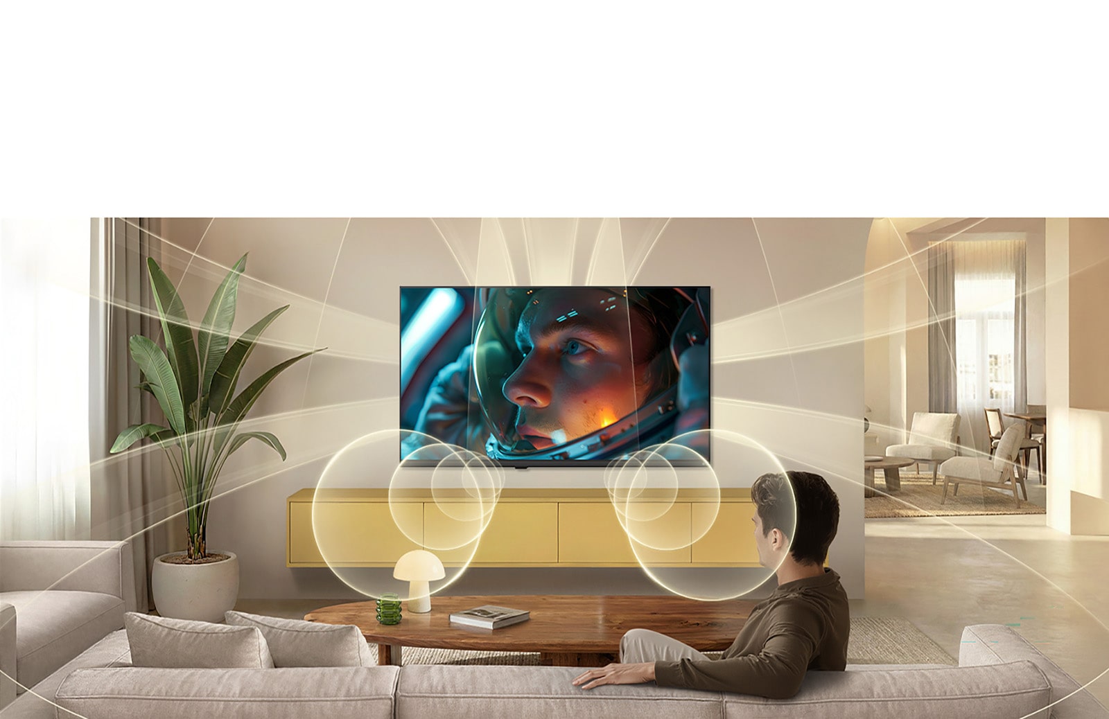 LG SMART TV AI LB70 FHD TV virtuaalisella 9.1.2-kanavaisella AI Soundilla täyttää modernin asuintilan astronauttielokuvan kohtauksen pyöriessä näytöllä, ympäröiden huoneen monisuuntaisella äänellä syvästi mukaansatempaavaa kokemusta varten.
