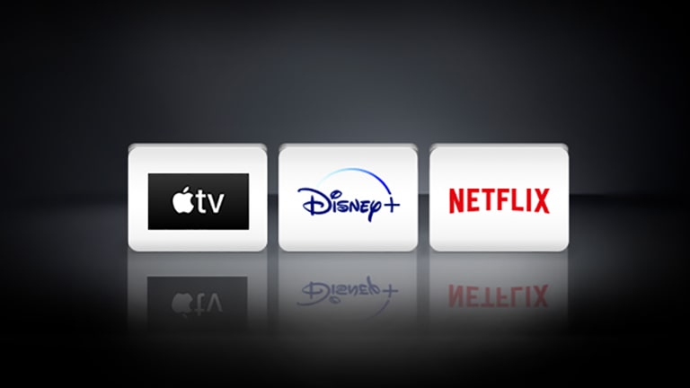 Apple TV-logo, Disney+-logo ja Netflix‑logo on järjestetty mustalle taustalle.