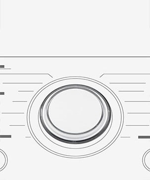 Tässä on suurennettu kuva pesukoneen käyttöpaneelin metallivalitsimesta.