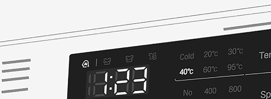 Tämä on suurennettu kuva pesukoneen paneelista, jotta näyttö näkyy selvästi.