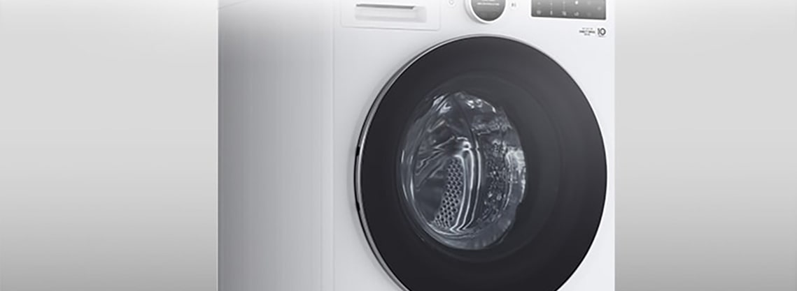 Siinä näkyy pesukone yksityiskohtaisesti.