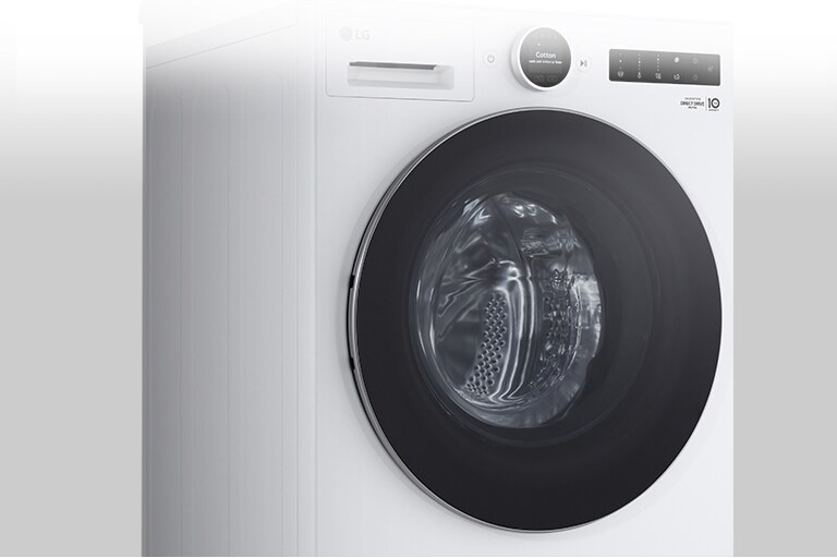 Siinä näkyy pesukone yksityiskohtaisesti.