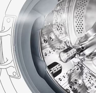 Kuva pesukoneen sisäpuolelta, jossa ruostumattomasta teräksestä valmistetut rummut näkyvät.