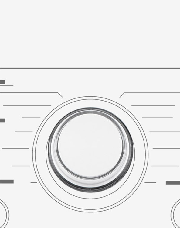 Tässä on suurennettu kuva pesukoneen käyttöpaneelin metallivalitsimesta.