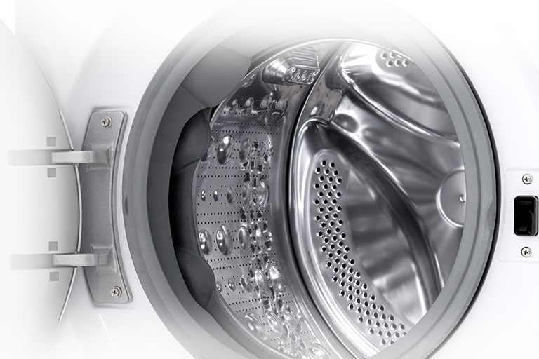 Siinä näkyy pesukoneen korin sisätila yksityiskohtaisesti.