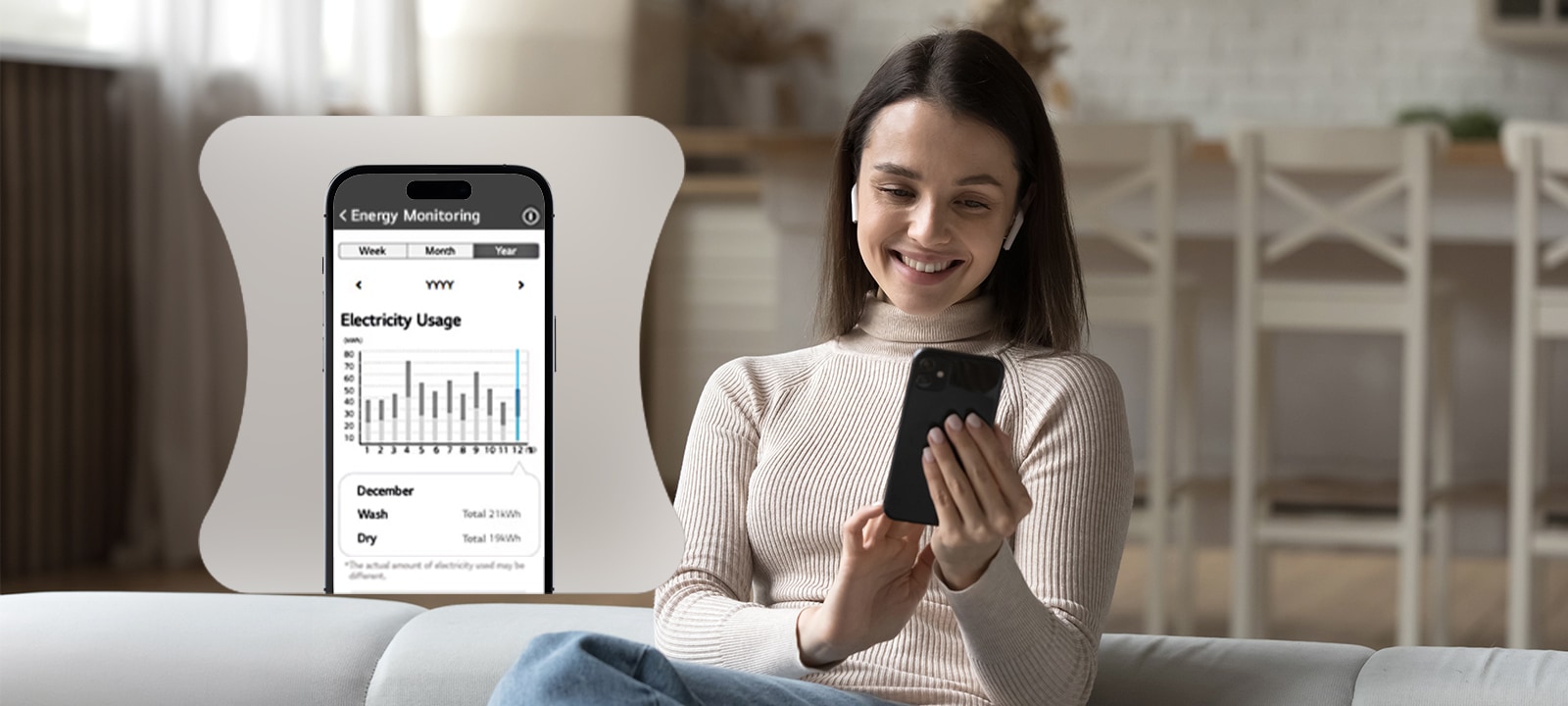 Nainen tarkkailee energiankulutustaan LG ThinQ -sovelluksen kautta.