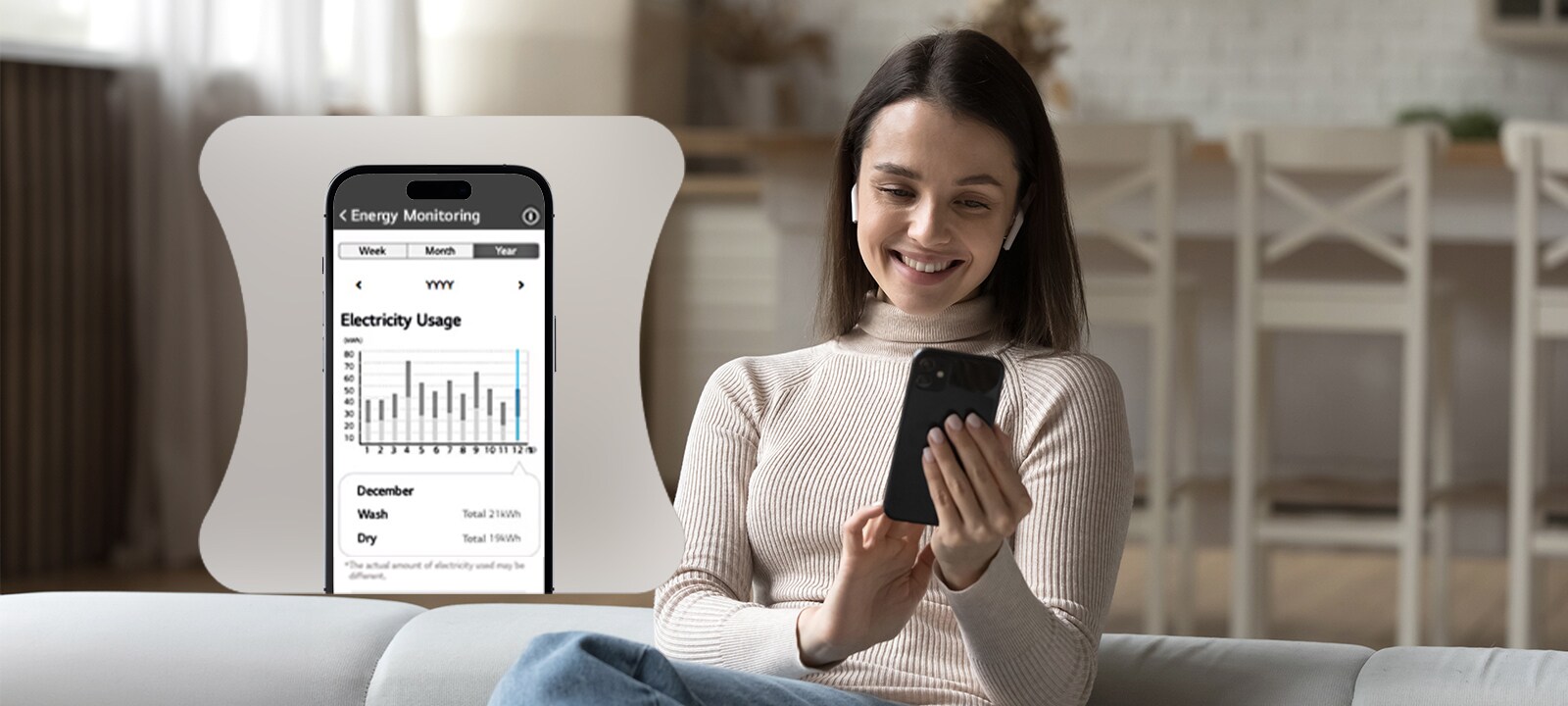 Nainen tarkkailee energiankulutustaan LG ThinQ -sovelluksen kautta.