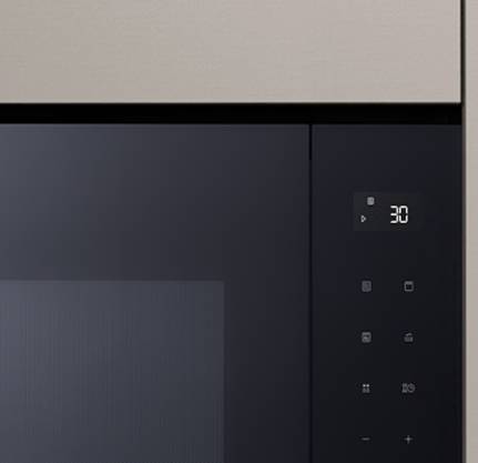 Integroidun mikroaaltouunin valkoinen LED-näyttö.