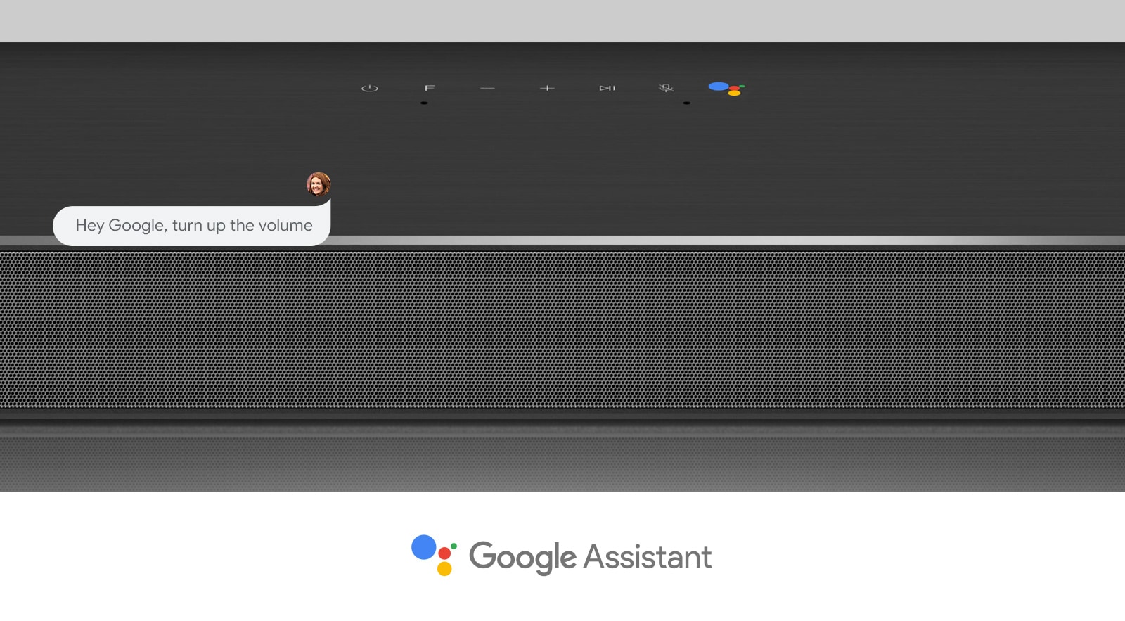 Lähikuva LG-soundbar-kaiuttimen keskiosasta, jossa on ääniohjauspainikkeet ja Google Assistant -logo. Ääntä kovemmalle Googlen ääniohjauksella. 