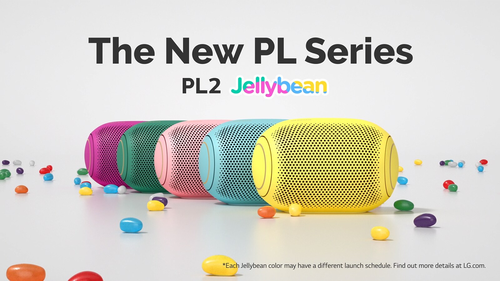 A front view of five colored jelly beans lined up behind each other.